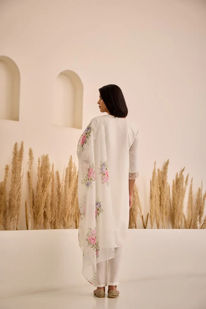 Neerus White Straight Embellished Kurta And Trousers With Dupatta.