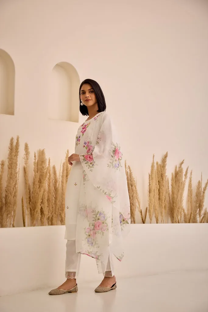 Neerus White Straight Embellished Kurta And Trousers With Dupatta.